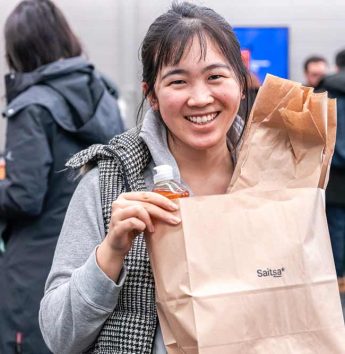 Tedi Market TediMarket StudentSmilingShoppingBag